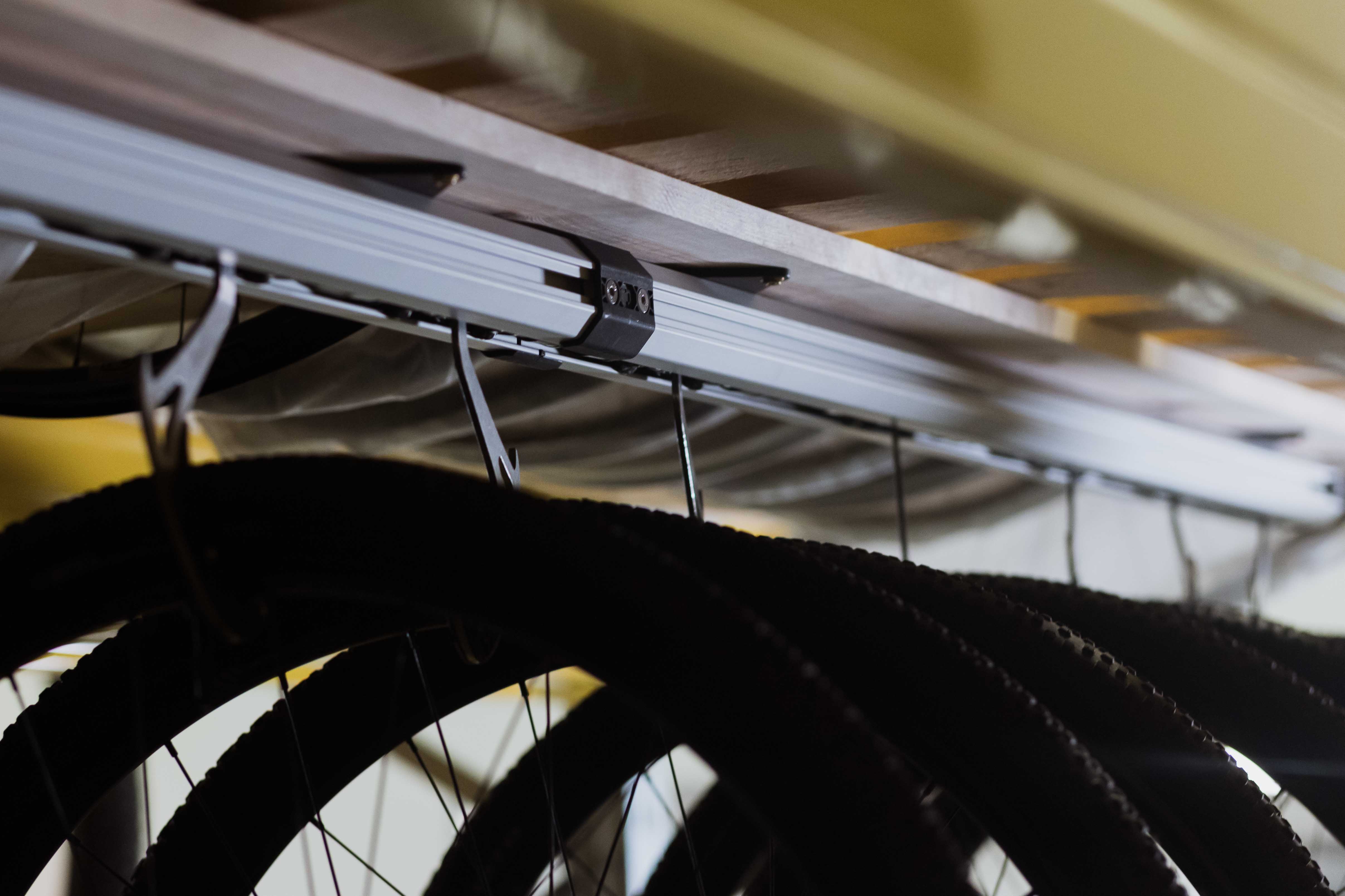 close up on the glide rail of a bike storage system
